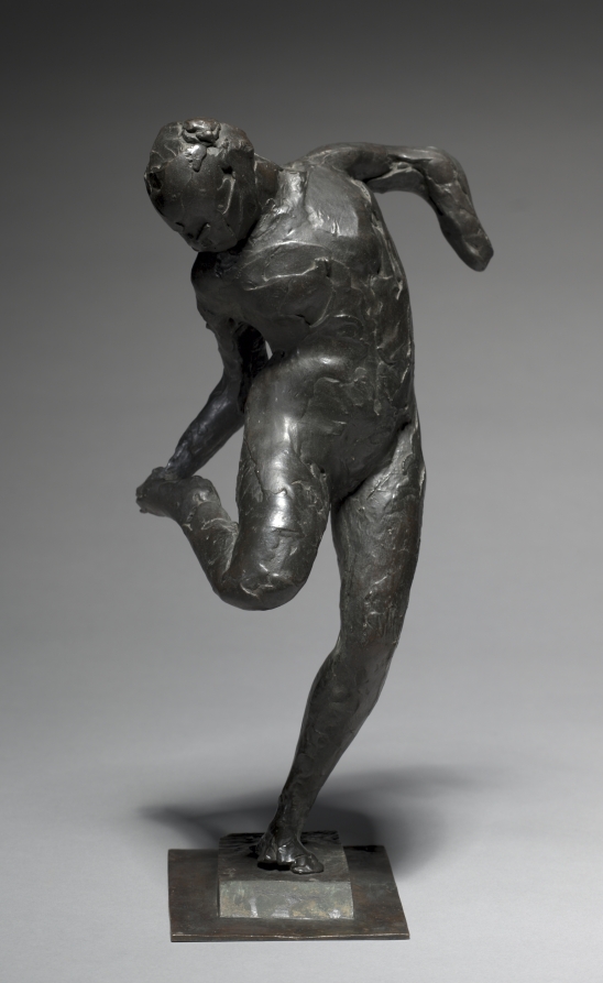 Urban Form: Dancer Looking at the Sole of her Right Foot